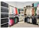 Spacious walk-in closet with ample shelving and hanging space at 117 Hardy Oaks Way, Holly Springs, NC 27540