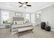 Serene main bedroom with a king-size bed and an ensuite bathroom at 117 Hardy Oaks Way, Holly Springs, NC 27540