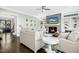 Cozy living room with fireplace and built-in shelving at 117 Hardy Oaks Way, Holly Springs, NC 27540