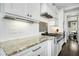 Modern kitchen with granite countertops and stainless steel appliances at 117 Hardy Oaks Way, Holly Springs, NC 27540