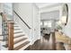 Bright and spacious entryway with hardwood floors and staircase at 117 Hardy Oaks Way, Holly Springs, NC 27540