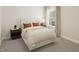 Cozy bedroom with a queen bed and neutral decor at 118 S Stone Mill Trl # 231, Clayton, NC 27520