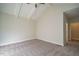 Spacious bedroom with carpeted floor and high ceilings at 6045 Scalybark Road, Durham, NC 27712