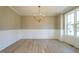 Formal dining room with hardwood floors and wainscoting at 6045 Scalybark Road, Durham, NC 27712
