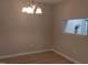 Simple dining area with wood-look floors and light walls at 204 Ridge Trl, Chapel Hill, NC 27516