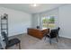 Home office with desk, chairs and large window at 108 Northwood Dr, Fuquay Varina, NC 27526