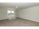 Spacious bedroom with large window and ample floor space at 108 Northwood Dr, Fuquay Varina, NC 27526