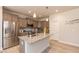 Modern kitchen with stainless steel appliances and granite countertops at 108 Northwood Dr, Fuquay Varina, NC 27526