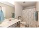 Clean bathroom with shower/tub combo, vanity, and updated fixtures at 108 Northwood Dr, Fuquay Varina, NC 27526