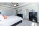Main bedroom with ceiling fan and ample closet space at 108 Northwood Dr, Fuquay Varina, NC 27526