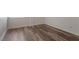Simple bedroom with dark hardwood floors at 7040 Longstreet Dr # C, Raleigh, NC 27615