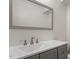 Bathroom with vanity and large mirror at 7040 Longstreet Dr # C, Raleigh, NC 27615