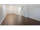 Bright dining room with hardwood floors and built-in cabinetry at 7040 Longstreet Dr # C, Raleigh, NC 27615