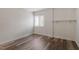 Simple bedroom with hardwood floors and a window at 7040 Longstreet Dr # C, Raleigh, NC 27615
