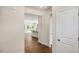 View of an entryway with hardwood floors and access to kitchen and other rooms at 268 Umstead St, Sanford, NC 27330