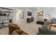 Open loft area with seating and shelving at 732 Apple Churn Dr, Fuquay Varina, NC 27526