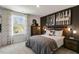 Cozy bedroom with a dresser, window, and stylish wall art at 732 Apple Churn Dr, Fuquay Varina, NC 27526