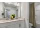 Clean bathroom with double vanity and a shower/tub combo at 732 Apple Churn Dr, Fuquay Varina, NC 27526