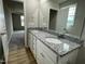 Double vanity bathroom with granite countertop at 726 Sherrill Farm Dr, Benson, NC 27504