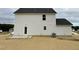 New construction home showcasing a side view, showcasing vinyl siding and a spacious backyard at 726 Sherrill Farm Dr, Benson, NC 27504