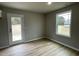 Simple bedroom with door leading to backyard at 726 Sherrill Farm Dr, Benson, NC 27504