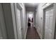 Bright hallway with access to bedrooms and other rooms at 108 N Charles St, Roxboro, NC 27573