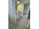Bathroom with white vanity and marble-look tile at 137 Swain St, Clayton, NC 27527
