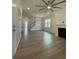 Bright living room featuring hardwood floors and a ceiling fan at 137 Swain St, Clayton, NC 27527