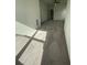 Bright bedroom with ceiling fan and grey carpet at 137 Swain St, Clayton, NC 27527