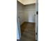 Walk-in closet with wood shelving and hardwood floor at 137 Swain St, Clayton, NC 27527