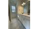 Bathroom with double vanity, marble flooring and a shower at 137 Swain St, Clayton, NC 27527