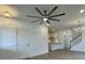 Open living room with hardwood floors and kitchen view at 137 Swain St, Clayton, NC 27527