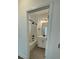 Clean bathroom with a bathtub, shower, vanity and neutral tile at 124 Swain St, Clayton, NC 27527