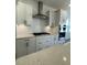 Spacious kitchen with stainless steel appliances and white cabinets at 124 Swain St, Clayton, NC 27527