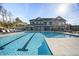 Large community pool with plenty of lounge chairs at 124 Swain St, Clayton, NC 27527