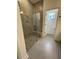 Modern shower with a frameless glass enclosure and built-in seat at 124 Swain St, Clayton, NC 27527