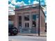 Classic building with columns and large windows, offering great commercial potential at 137 Swain St, Clayton, NC 27527