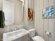 Powder room featuring a pedestal sink and toilet at 465 Douglas Falls Dr, Wendell, NC 27591