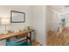 Charming home office features a wooden desk, teal chair, and built-in shelving at 465 Douglas Falls Dr, Wendell, NC 27591