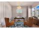 Bright office space with hardwood floors and stylish furniture at 465 Douglas Falls Dr, Wendell, NC 27591