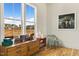Light-filled living room with mid-century modern console and stunning neighborhood views at 465 Douglas Falls Dr, Wendell, NC 27591
