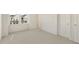 Spacious bedroom with carpeted floors and plenty of natural light at 465 Douglas Falls Dr, Wendell, NC 27591