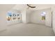 Spacious bedroom with a ceiling fan and multiple windows offering a view at 465 Douglas Falls Dr, Wendell, NC 27591