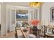 Dining room with French doors opening to a patio and view of homes at 465 Douglas Falls Dr, Wendell, NC 27591