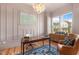 Elegant home office with built-in shelving and large windows at 465 Douglas Falls Dr, Wendell, NC 27591