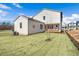 Charming house exterior with a spacious backyard at 465 Douglas Falls Dr, Wendell, NC 27591