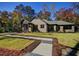 Brick house exterior with walkway and landscaping at 1414 Whippoorwill Ln, Chapel Hill, NC 27517