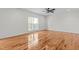 Living room with hardwood floors and large window at 1608 Irving Place, Creedmoor, NC 27522