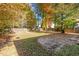 Large backyard with a patio and plenty of space for outdoor activities at 1608 Irving Place, Creedmoor, NC 27522