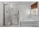 Bathroom with shower and garden tub at 1608 Irving Place, Creedmoor, NC 27522